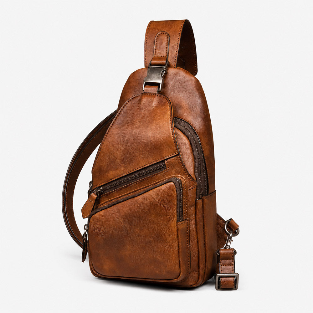 Handmade mens bum bag in vintage brown full-grain leather with holster-inspired shape and adjustable strap
