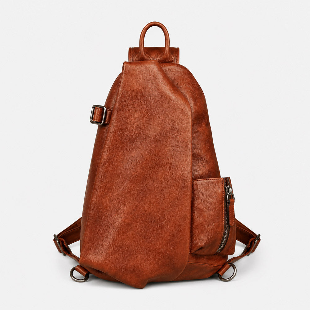 Front view of brown leather shoulder bag for men with oversized waist pack shape, metal zipper hardware, and vintage leather finish
