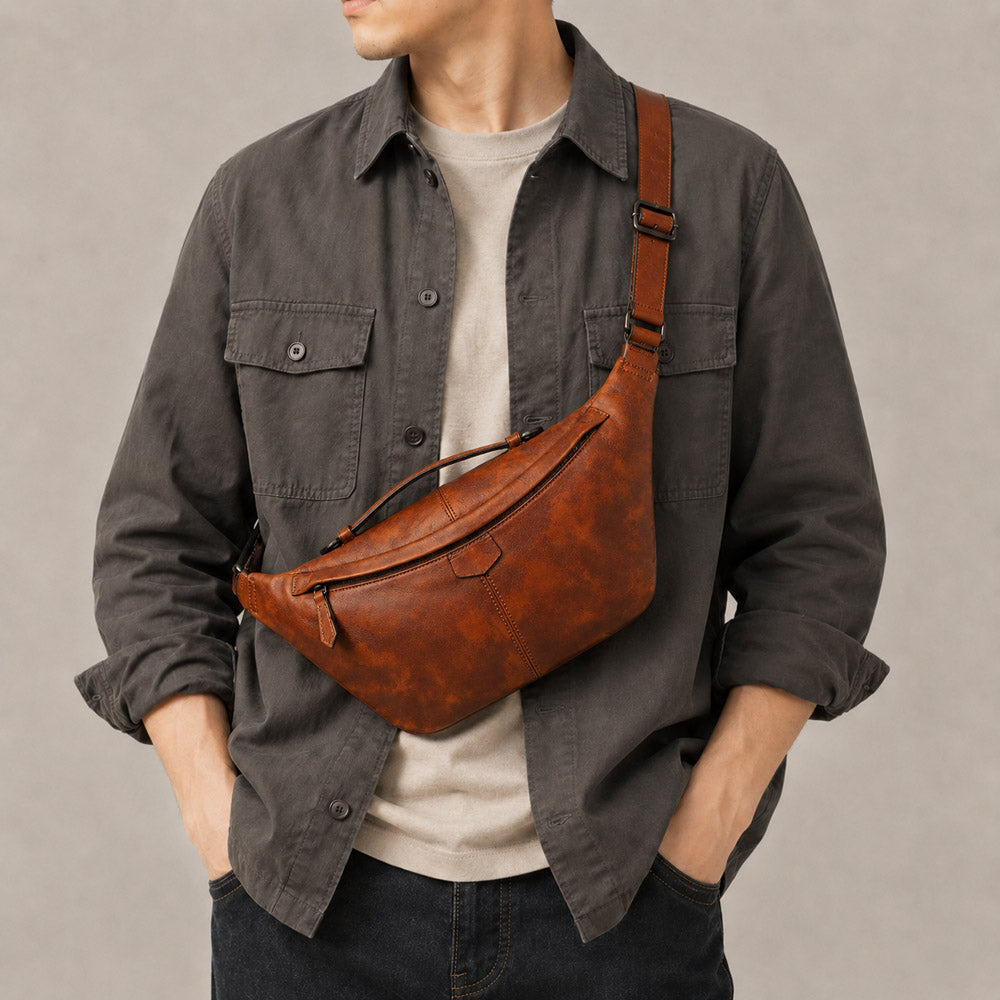 Large dark brown leather shoulder bag worn crossbody on model, showing hands-free vintage styling for daily city carry
