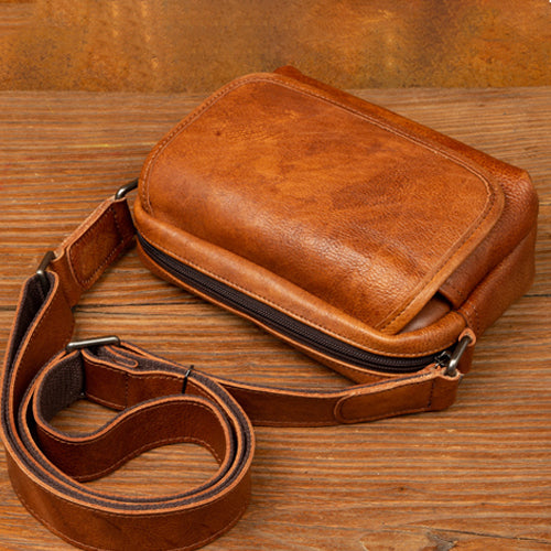 brown leather messenger bag
