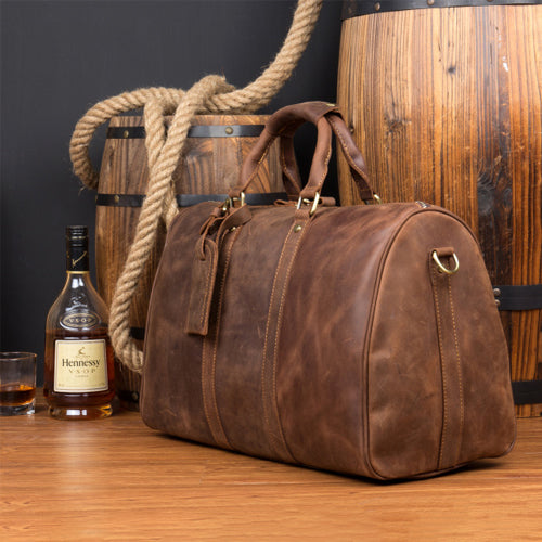 Brown leather duffel bag